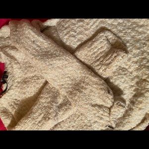 Small, tan and white pull over sweater